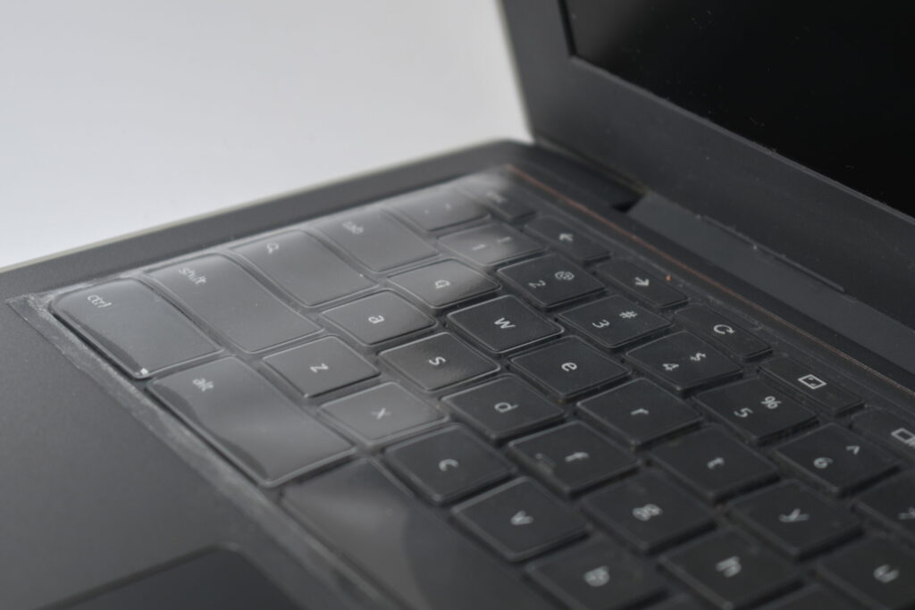 SHows a Chromebook with Keyboard cover installed